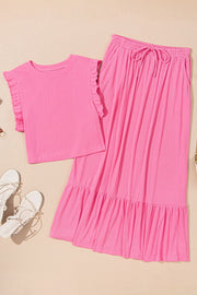 Pink ribbed co-ord skirt set with ruffled sleeves and tiered hem skirt with drawstring waist
