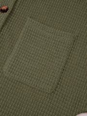 Moss waffle-knit shirt with button detail and chest pocket