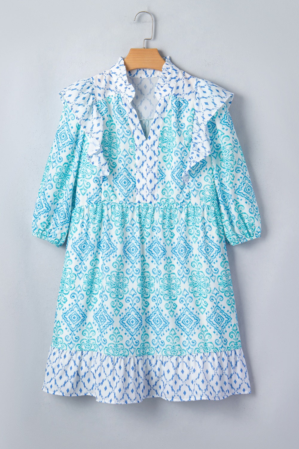 Blue patchwork ruffle mini dress with balloon sleeves and a tiered hem.