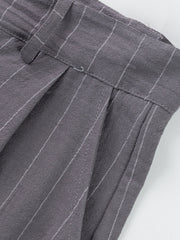 Grey pinstripe sweatpants with pleats and a belted waist detail.