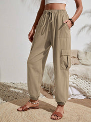 Khaki textured cargo lounge trousers with drawstring waist and cuffed ankles.