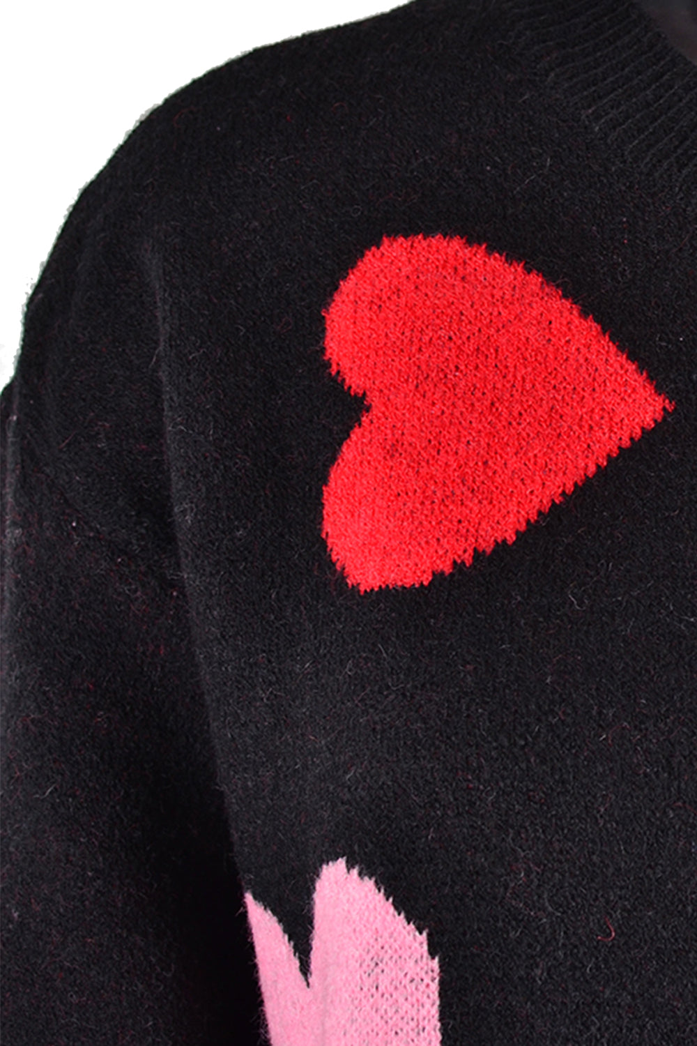 Black crewneck sweater with red and blush pink intarsia hearts.