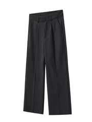 Black pleated wide-leg trousers with a contemporary cut and front pockets.