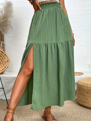 Textured tiered maxi skirt in matcha green with a high slit and smocked waist.