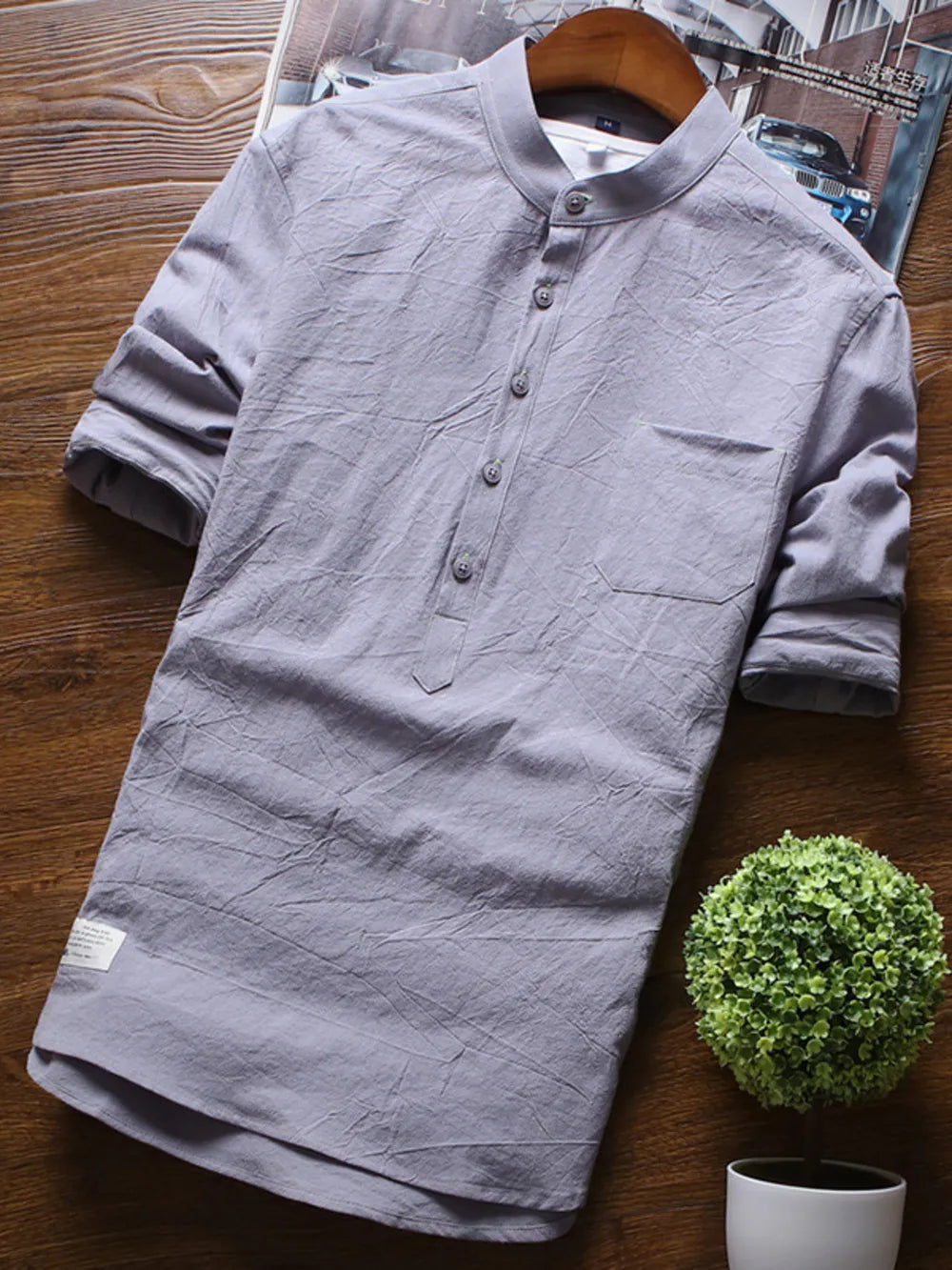 Grey cotton casual shirt with Mandarin collar, 3/4 sleeves, and buttoned placket.
