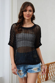 Black open-knit slouchy shoulder cover-up with short sleeves and a crew neck.