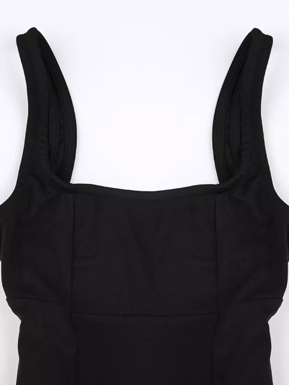 Black backless mini dress with square neckline and wide straps.