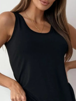 Black mini dress with scoop neck and sleeveless cut, featuring a lace-trimmed tulle hem.