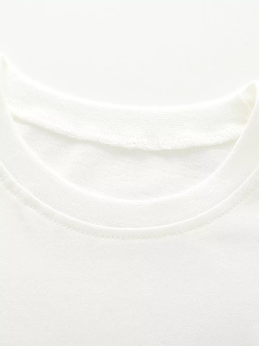 White cotton toddler t-shirt with crew neck detail
