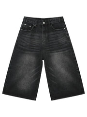 Black wide-leg denim culottes with a washed finish and D-ring detail.