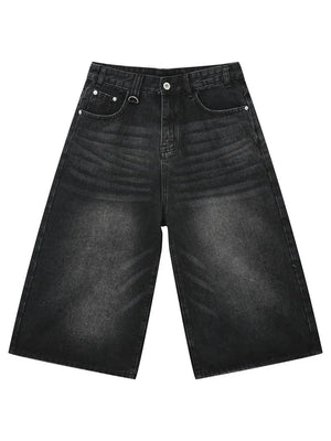 Black wide-leg denim culottes with a washed finish and D-ring detail.