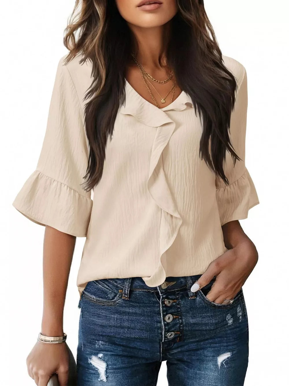 Apricot cascading ruffle V-neck shirt with 3/4 bell sleeves.