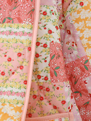 Floral quilted patchwork jacket in pink and yellow with red roses and white flowers.