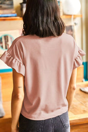 Pink ribbed t-shirt with ruffled short sleeves and relaxed fit