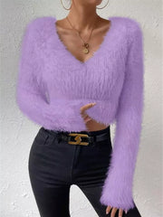 Lavender fluffy v-neck knit top with long sleeves and a cropped fit.