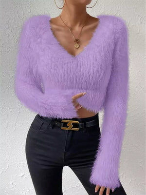 Lavender fluffy v-neck knit top with long sleeves and a cropped fit.