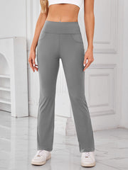 Gray flared activewear pants with pocket detail and high waist