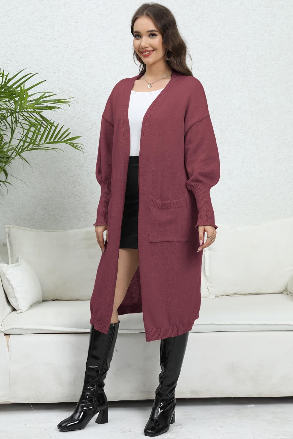 Burgundy oversized pocketed knit cardigan with V-neck and long sleeves