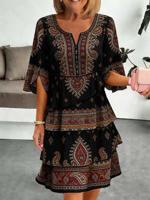Black paisley print tiered mini dress with split sleeves and V-neck