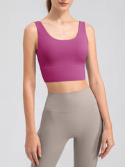 Red-Violet performance crop top with scoop neck and wide band.