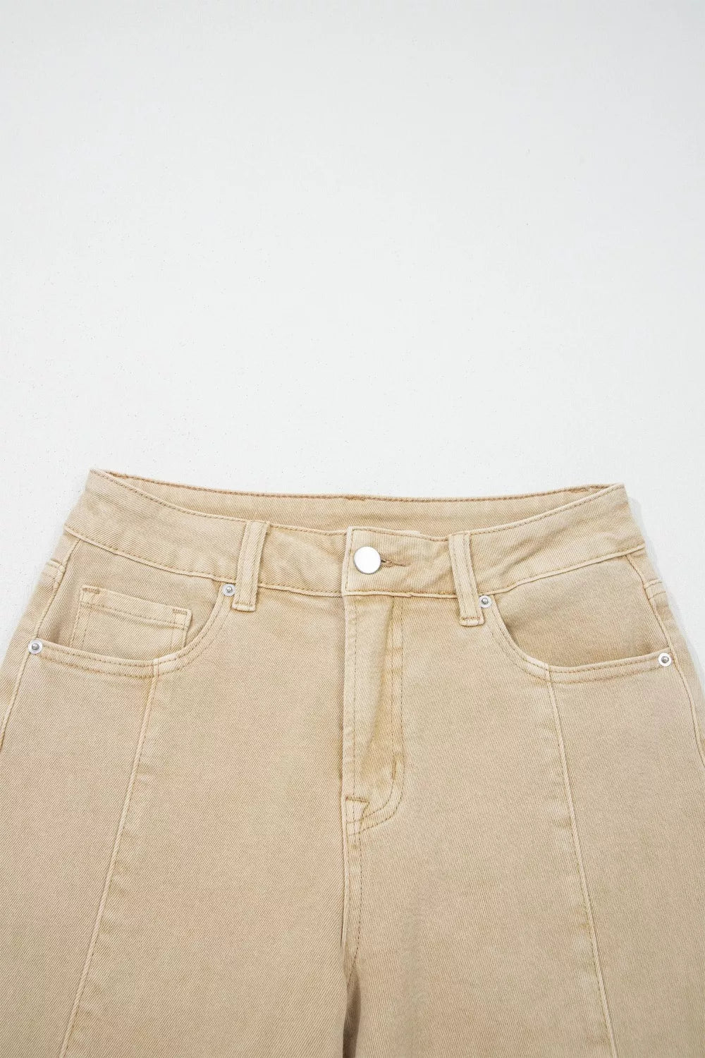 High-waisted cropped wide-leg jeans in tan denim with front pockets and button closure.