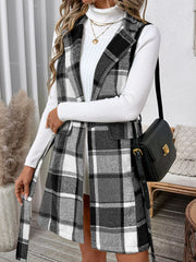 Plaid longline vest in dark gray with a belted waist and notched lapels.
