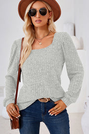 Light gray ribbed square neck top with puffed long sleeves.