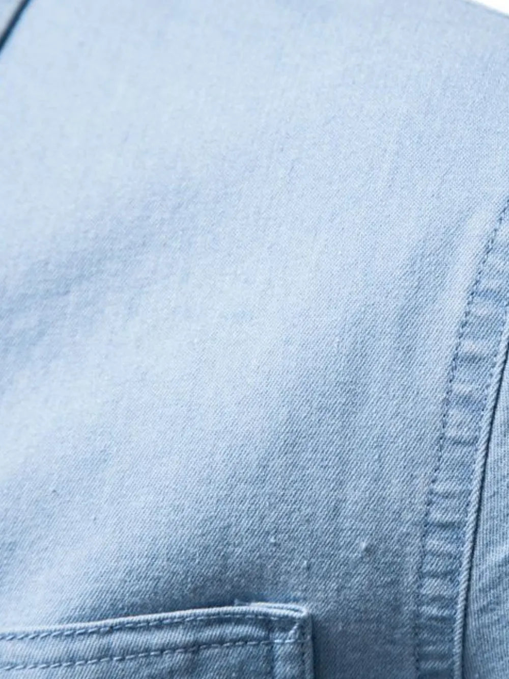Light blue faded denim utility shirt with chest pocket detail