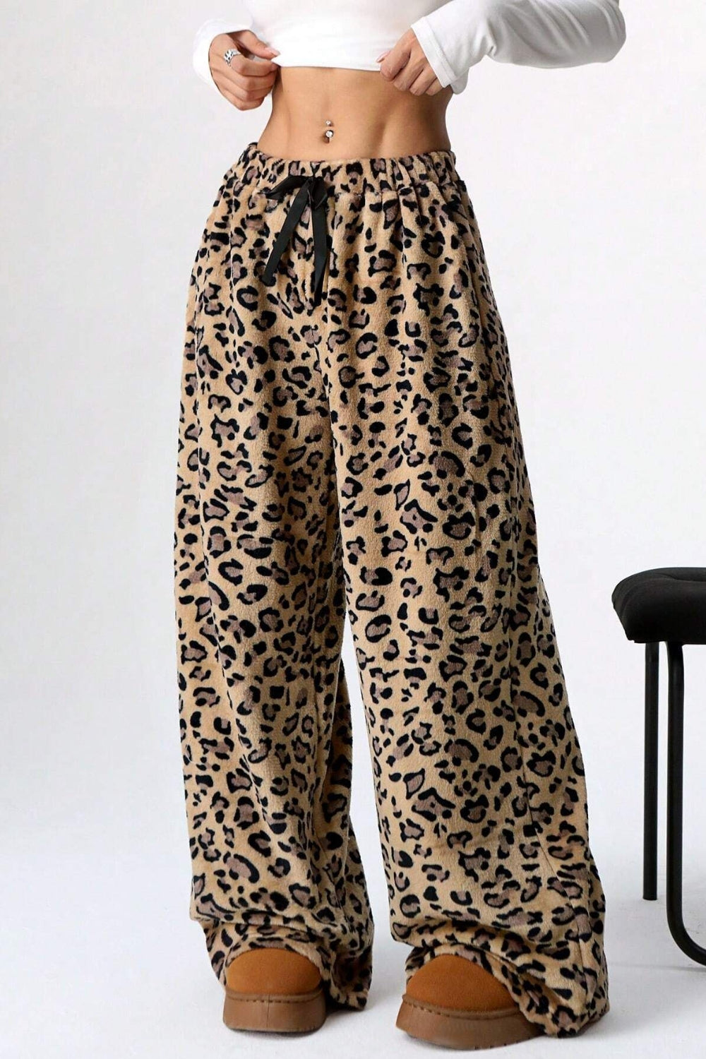 Leopard plush palazzo lounge pants with drawstring waist and wide leg.