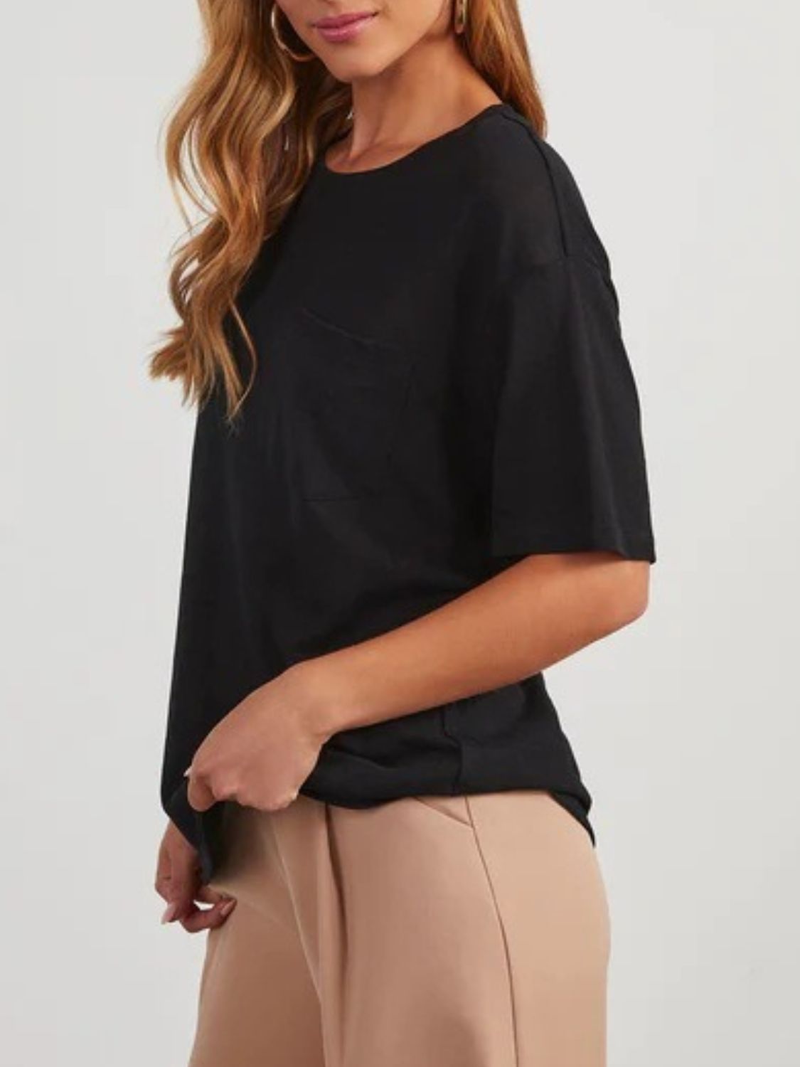 Black linen boxy tee with patch pocket and crew neck.