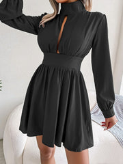Black fit-and-flare mini dress with keyhole neckline and long sleeves