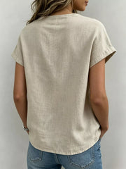 Khaki relaxed fit shirt with short sleeves and a bow-tie neck detail.