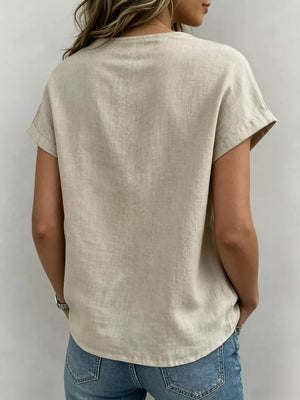 Khaki relaxed fit shirt with short sleeves and a bow-tie neck detail.
