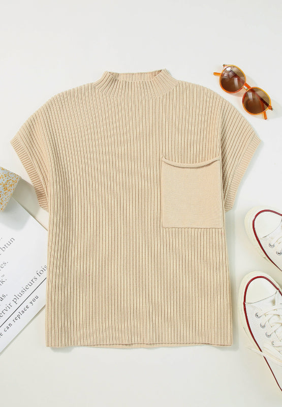 Ribbed knit mock neck top in cream with short sleeves and a chest pocket.