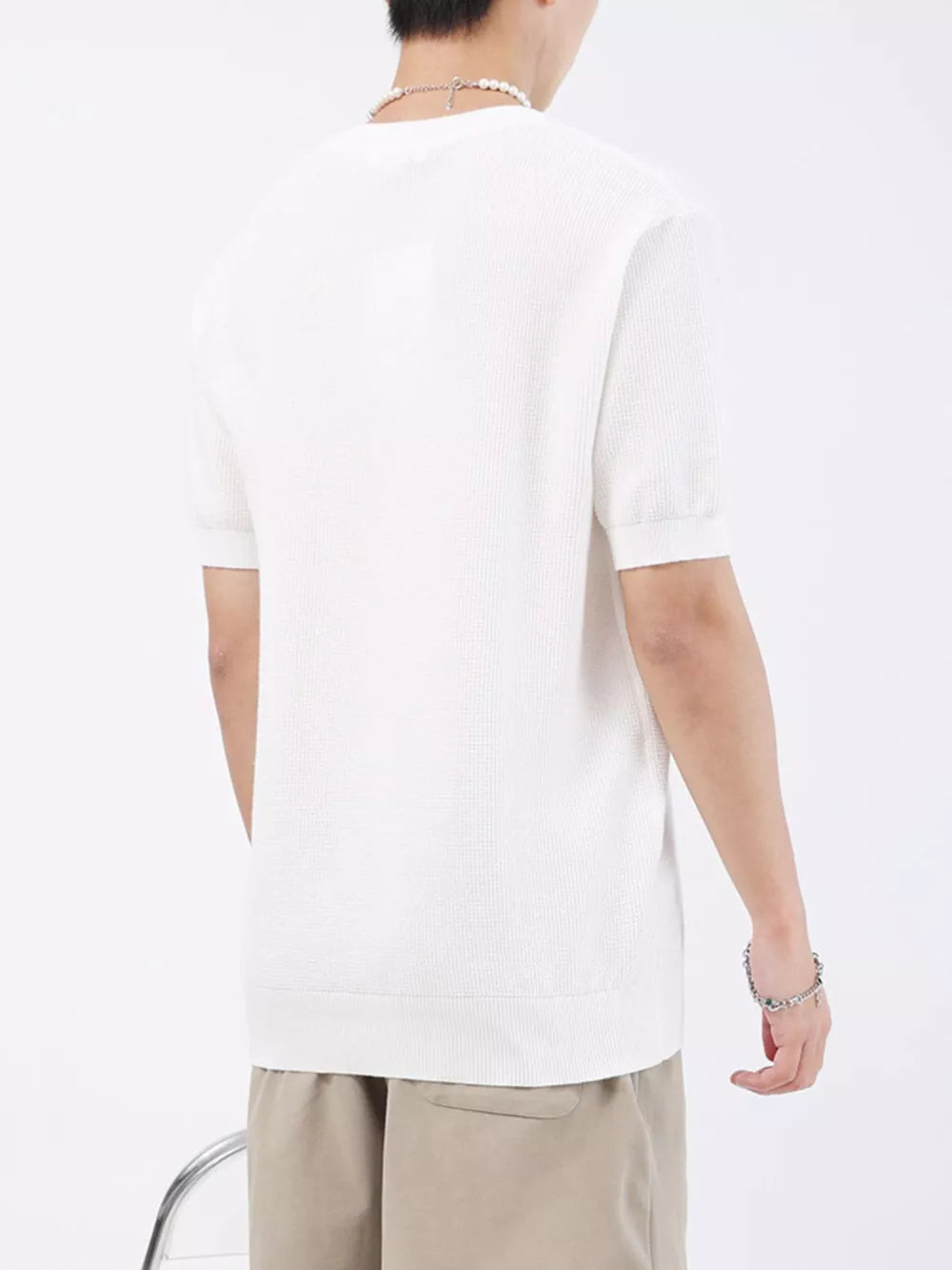 White knit henley t-shirt for men, short sleeves, textured fabric.