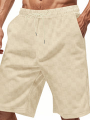 Men's beige checkered chino shorts with drawstring waist and pockets.