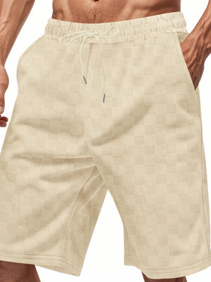Men's beige checkered chino shorts with drawstring waist and pockets.
