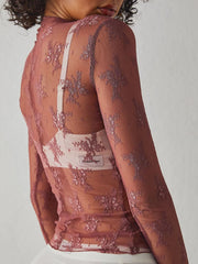 Burgundy floral lace illusion mock neck top with long sleeves.