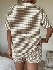 Striped two-piece set with drawstring shorts and short sleeve top in brown and white.