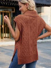 Cable knit turtleneck vest in caramel with side slits and a relaxed fit.