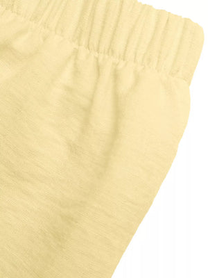 Yellow peplum hem two-piece set with button detail, elastic waistband detail