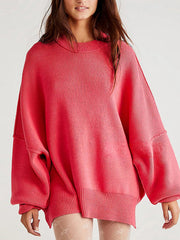 Oversized ribbed knit sweater in strawberry with drop shoulders and crew neck.