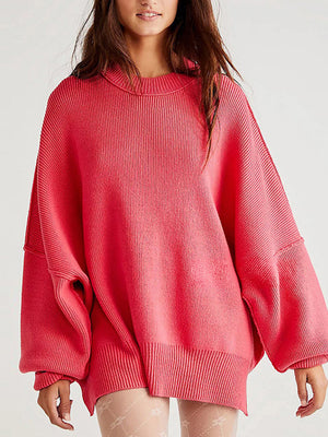Oversized ribbed knit sweater in strawberry with drop shoulders and crew neck.