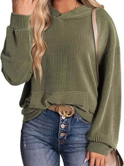 Green ribbed V-neck oversized hoodie sweatshirt with balloon sleeves and a front pocket detail.