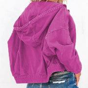 Fuchsia denim utility hoodie with drawstring hood and buttoned cuffs.