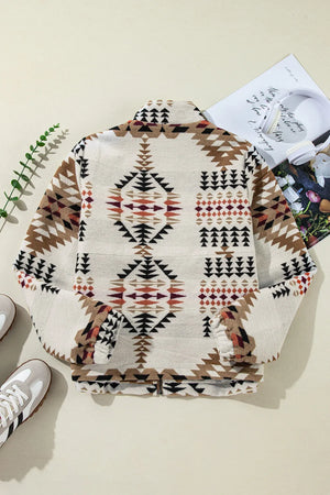 Southwestern quilted zip-up jacket in eggshell with geometric pattern, long sleeves, and collar.
