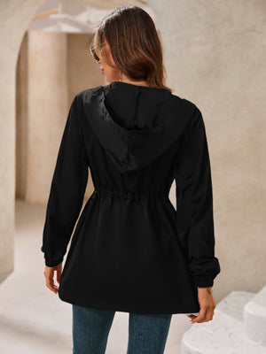 Black hooded jacket with cinched waistline and long sleeves