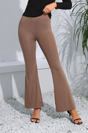 Camel flare leggings with a high waist and subtle contouring detail.