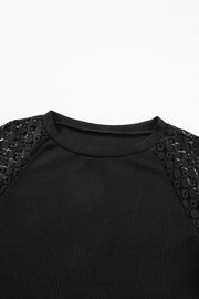 Black waffle knit raglan top with lace yoke detail