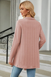 Dusty Pink textured knit cardigan with asymmetrical hem and long sleeves.